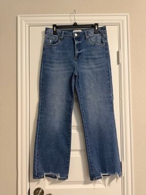 Risen Straight-Leg Women's Jeans in Mid Blue with distressed Hem